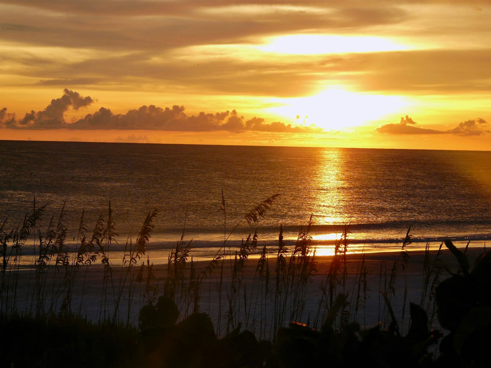 A Gulf sunset over the beach at Anna Maria Island