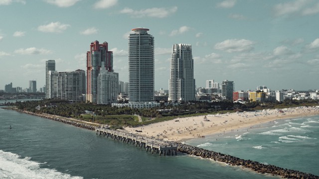 A Miami Beach view — the sand and the city skyline behind it