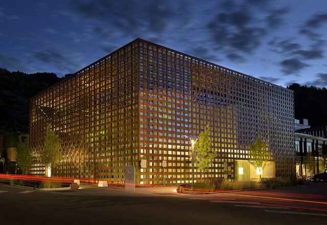 The Aspen Art Museum's woven-wood facade lit at dusk