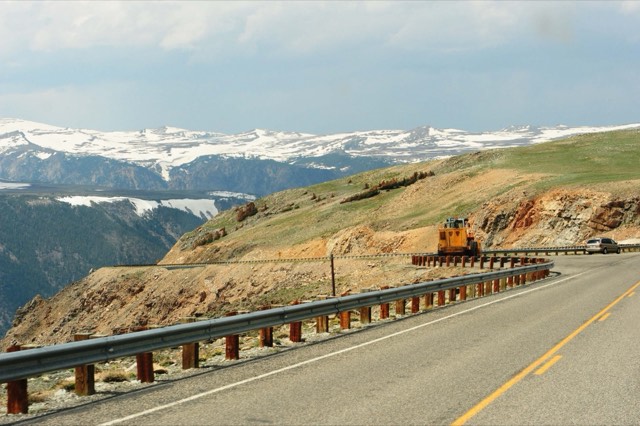 The Beartooth Highway climbing above treeline past snowfields