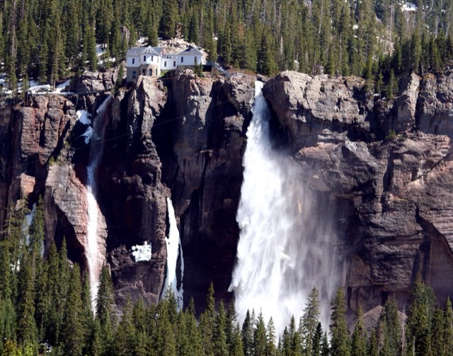 Bridal Veil Falls plunging down the cliff below the historic Smuggler-Union power house