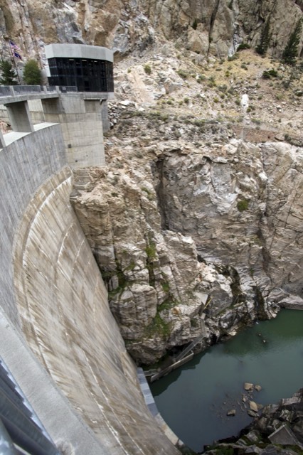 Buffalo Bill Dam in its canyon with the visitor center on top