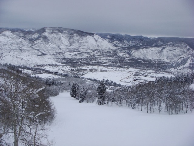 A winter view over the Aspen valley from a run at Buttermilk Mountain