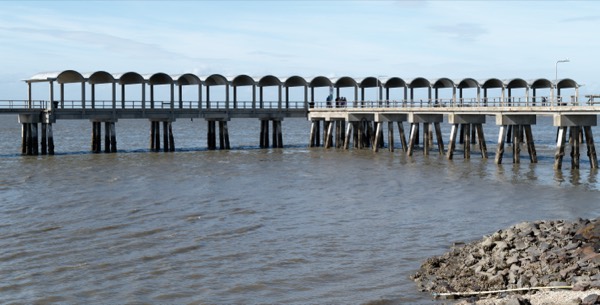 The arched covered fishing pier at Clam Creek on Jekyll Island's north end