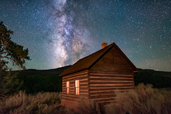 The historic Fruita schoolhouse beneath the Milky Way in Capitol Reef's dark sky