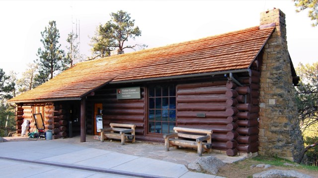 The historic log visitor center at Devils Tower National Monument