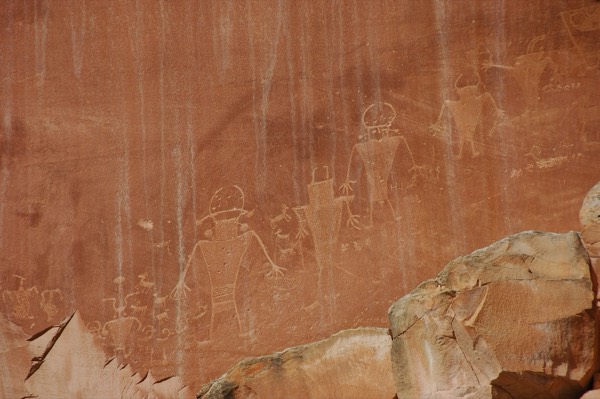 A Fremont petroglyph panel of anthropomorph figures carved into red rock