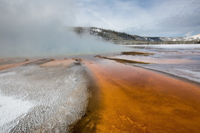 Vivid orange and blue thermophile mats at Grand Prismatic Spring