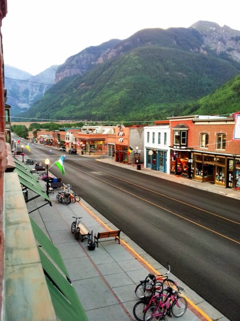 Colorado Avenue, Telluride's historic main street, looking up the canyon to the peaks