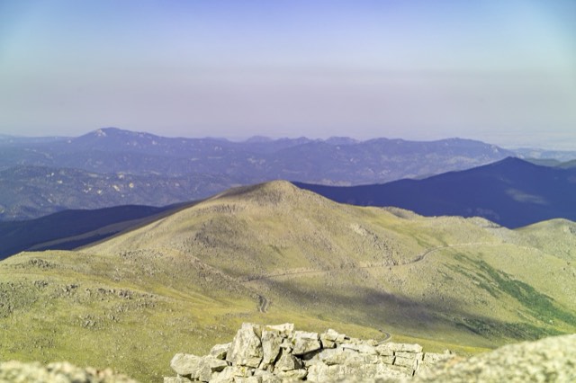 The Mount Blue Sky scenic byway winding across the alpine tundra with Rogers Peak beyond