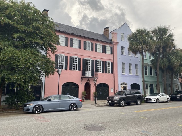The pastel-painted historic houses of Rainbow Row along East Bay Street in Charleston