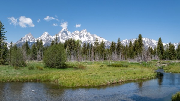 The Teton Range reflected in the Snake River at Schwabacher Landing