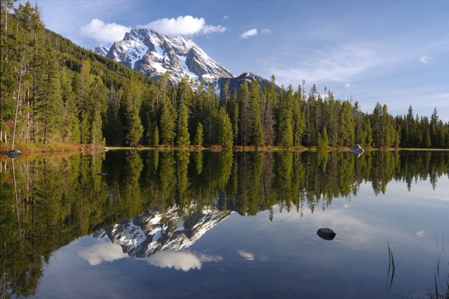 Mount Moran reflected in the still water of String Lake