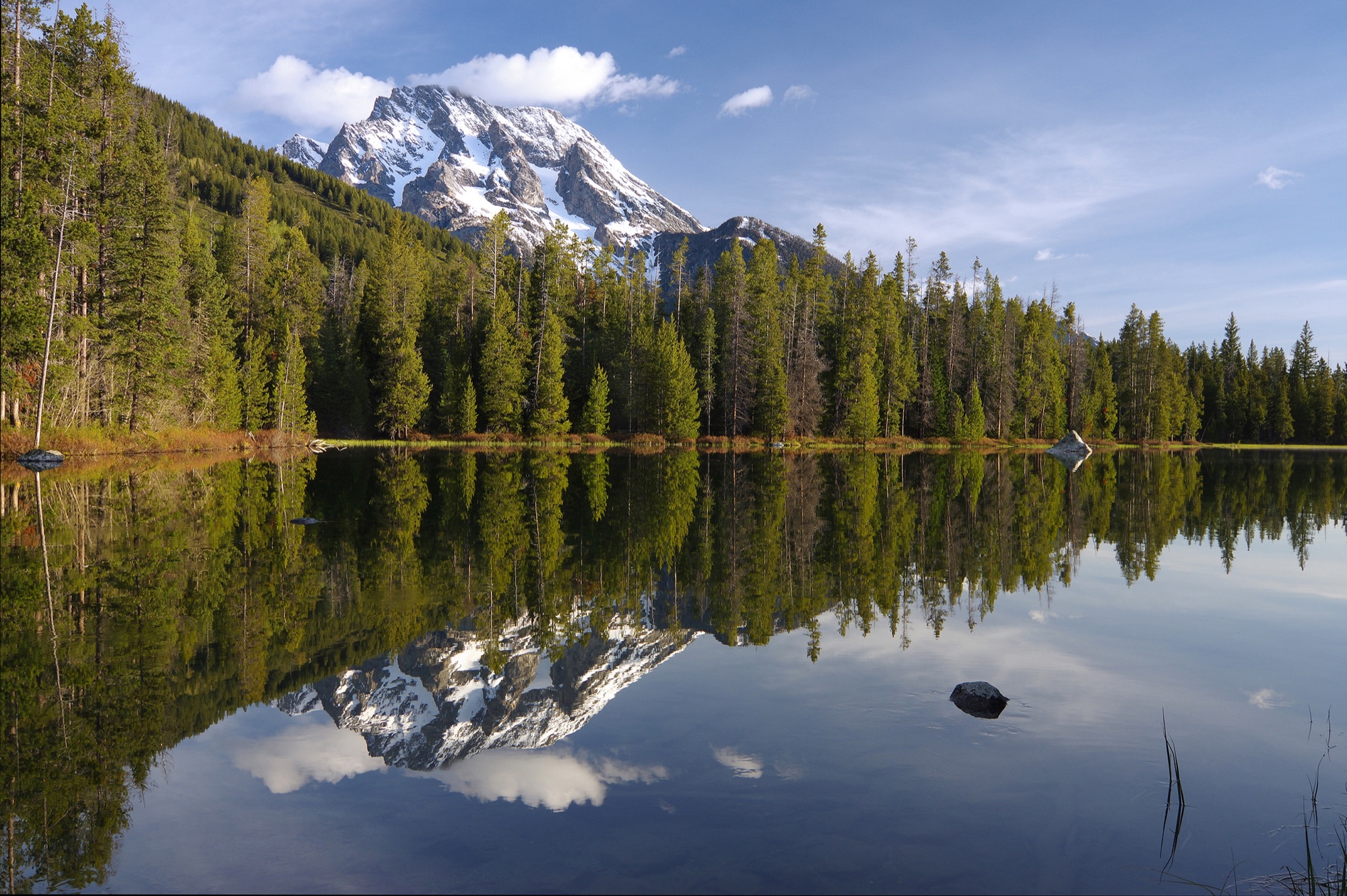Mount Moran reflected in the still water of String Lake