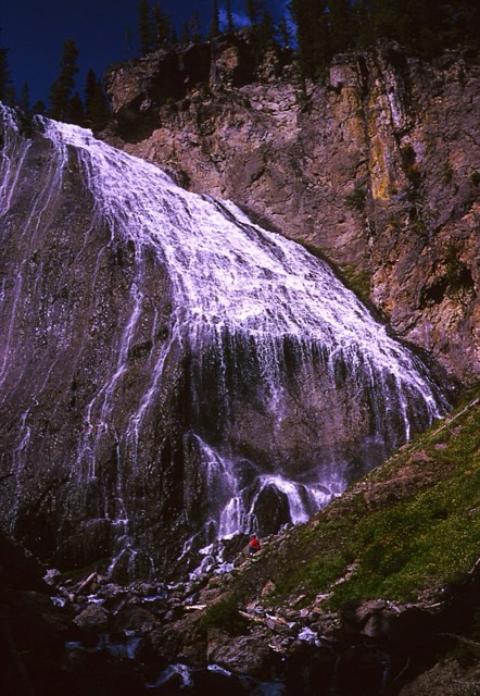 Ouzel Falls tumbling down the cliff in the Wild Basin area