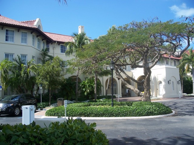 The cream-colored Mediterranean facade and arched loggia of Casa Marina in Key West
