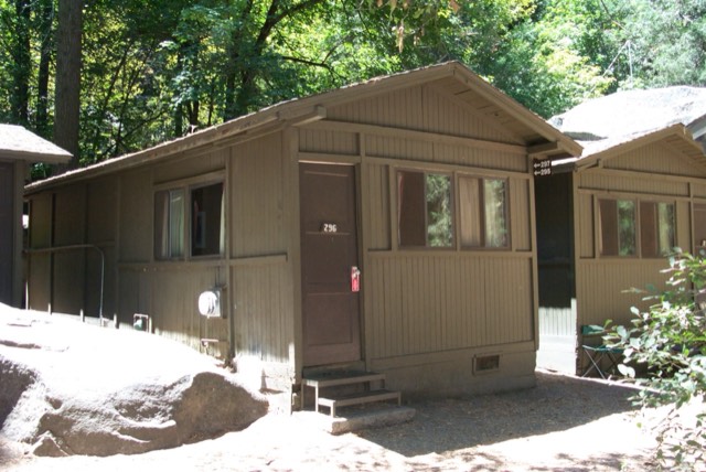 A historic wooden cabin at Curry Village in Yosemite Valley