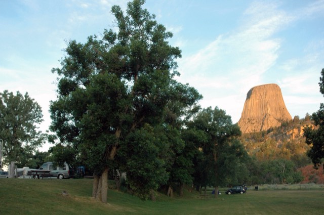 The KOA campground grounds with Devils Tower glowing at sunrise