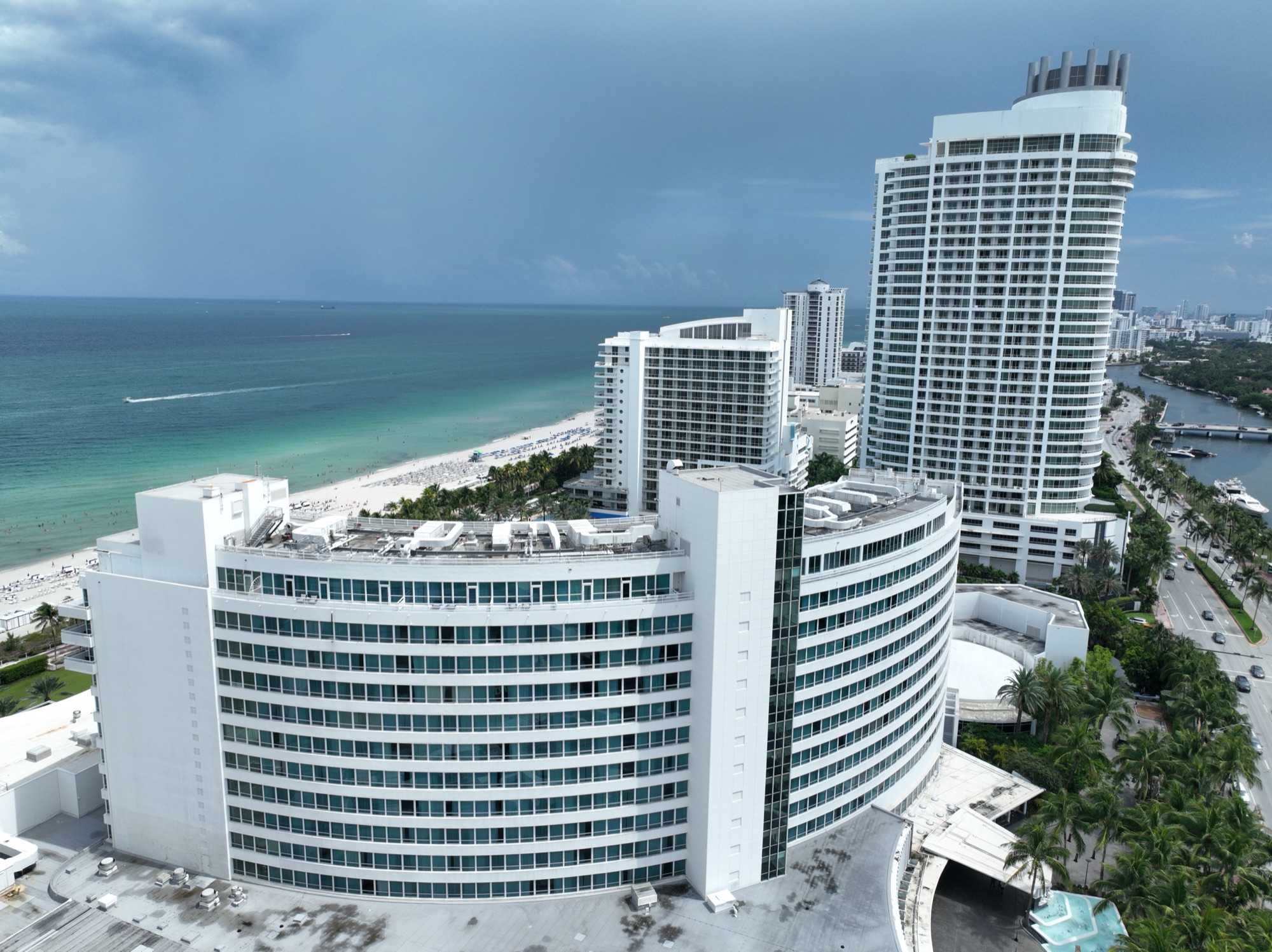 An aerial view of the curved Morris Lapidus Fontainebleau resort tower on the Miami Beach oceanfront