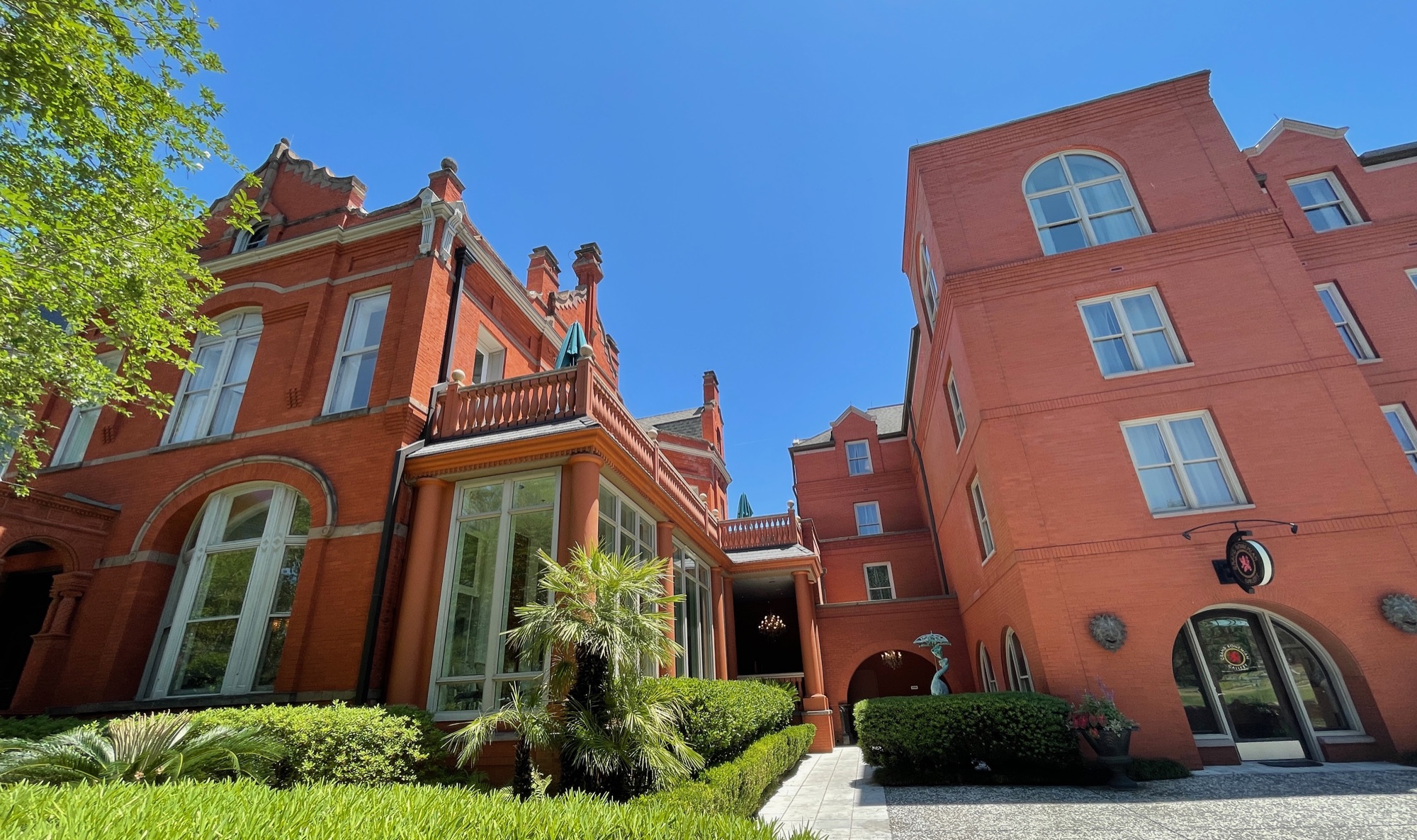 Hotel Bardo Savannah — the restored 1888 red-brick Lewis Kayton House (former Mansion on Forsyth Park) with its garden on Drayton Street