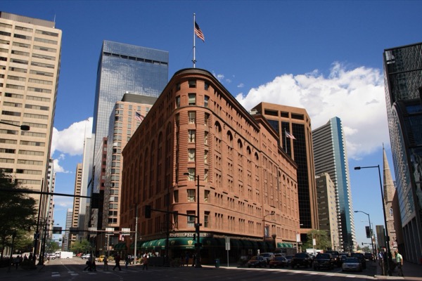 The 1892 triangular red-sandstone Brown Palace Hotel amid downtown Denver