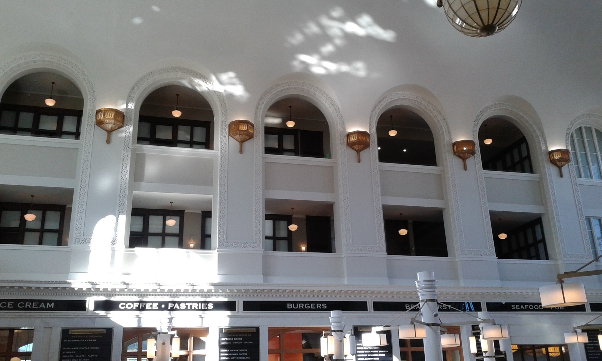 The Crawford Hotel's arched guest-room windows above the Great Hall inside Denver Union Station