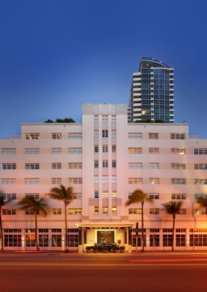 The Setai, Miami Beach — its restored 1930s Art Deco building at dusk on Collins Avenue, the tower rising behind
