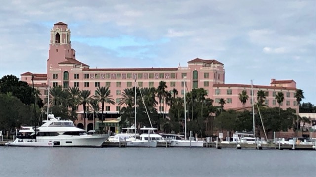 The pink Vinoy resort and its bell tower seen across the St. Petersburg marina