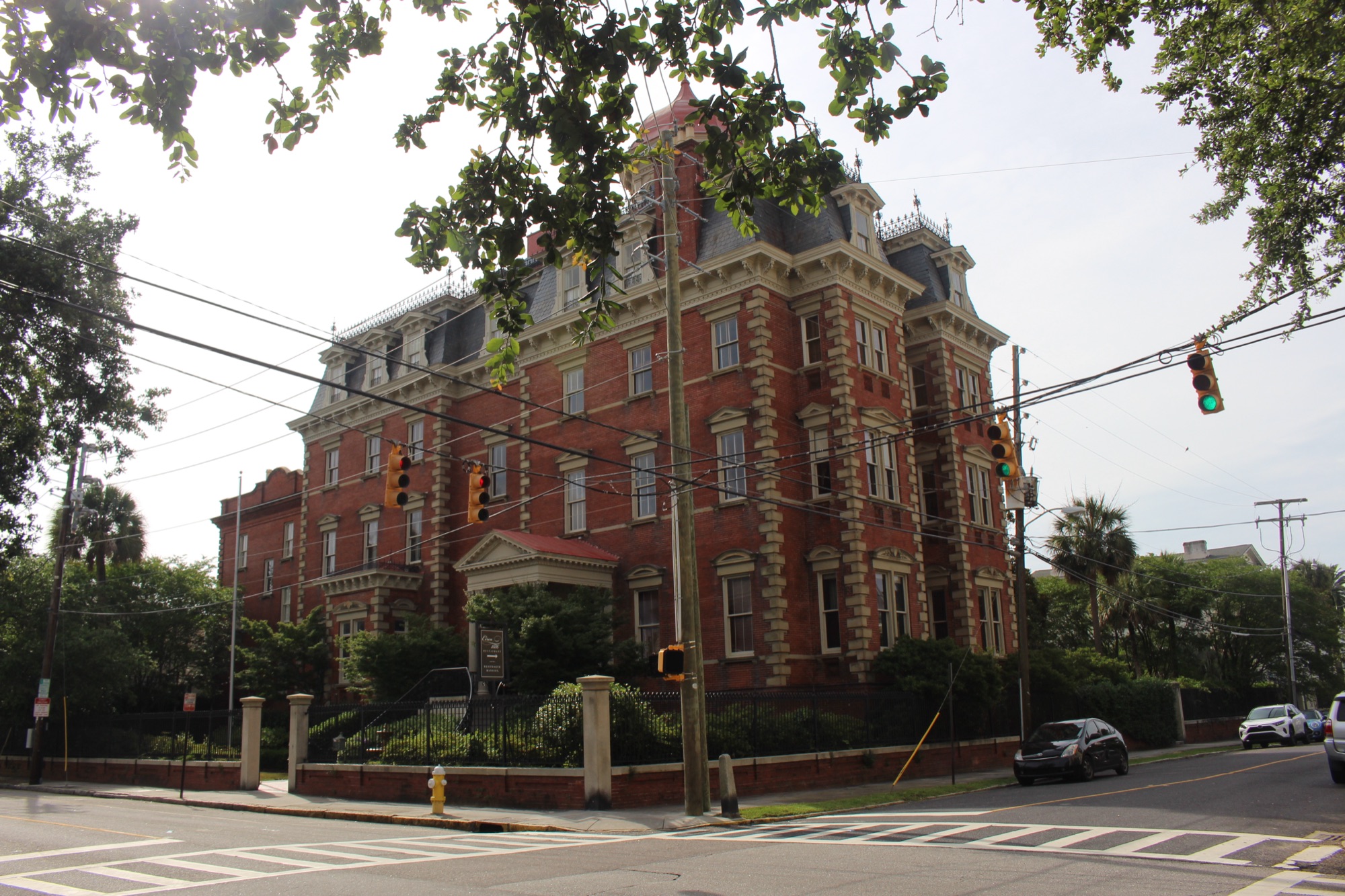Wentworth Mansion — the grand 1886 red-brick Second Empire mansion with a mansard roof and rooftop cupola in Charleston's Harleston Village