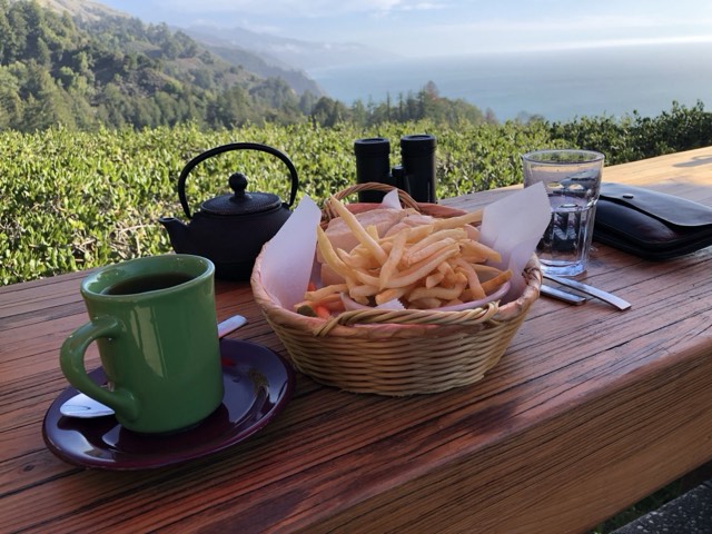 A table on Nepenthe's cliff-edge terrace overlooking the Big Sur coast