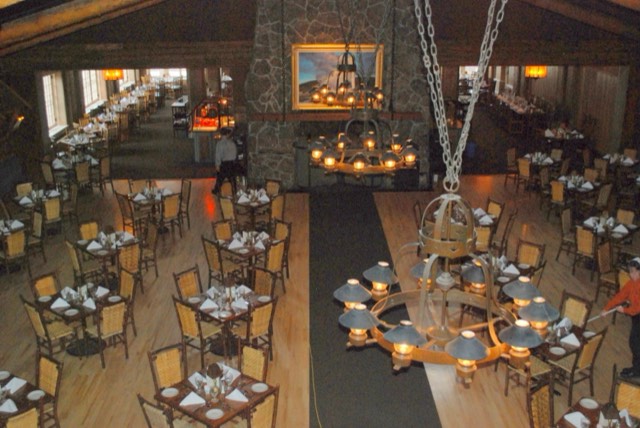 The timber-framed dining room of the Old Faithful Inn