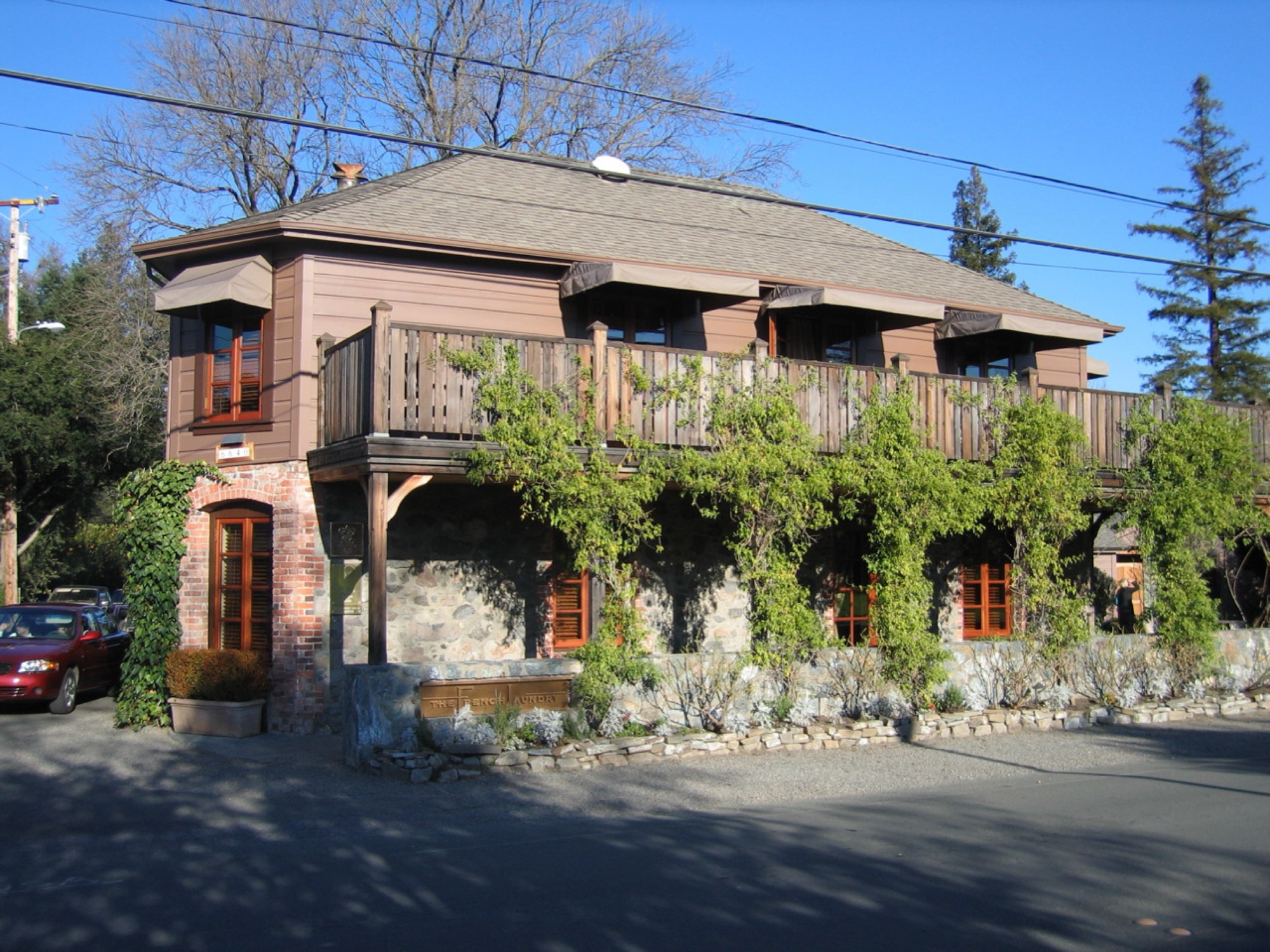 The historic ivy-covered stone-and-timber French Laundry restaurant building in Yountville