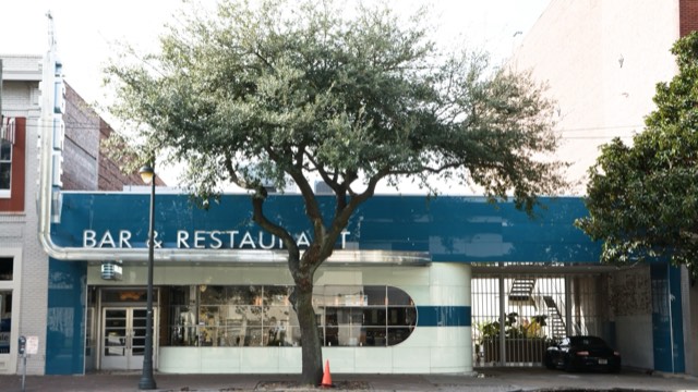 The Grey — the restored 1938 Streamline Moderne Greyhound bus terminal, teal and chrome, that houses the restaurant in Savannah